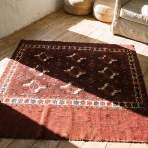 Antique Deep Red Field Late 19th Century Turkmen Repeating Tribal Geometric Guls Tekke Rug (SKU 18349) - styled overhead view