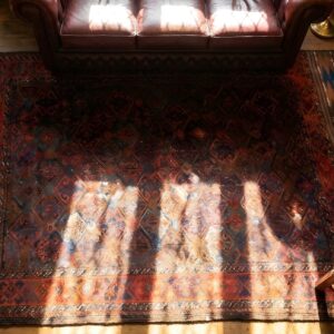 Deep Rich Color Tribal Antique Persian Baluch Allover Geometric Rug (SKU 25185) - styled overhead view