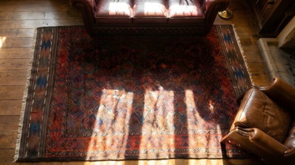 Deep rich color tribal antique persian baluch allover geometric rug 2 Deep rich color tribal antique persian baluch allover geometric rug (sku 25185) - styled overhead view