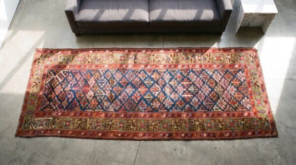 Early 19th century antique nw persian tribal shrub design hallway runner 2 Early 19th century antique nw persian tribal shrub design hallway runner (sku 21410) - styled overhead view