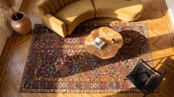 Earthy brown antique tribal geometric nw persian kurdish rug 2 Earthy brown antique tribal geometric nw persian kurdish rug (sku 19480) - styled overhead view