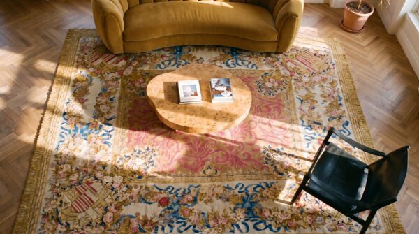 Antique english armorial axminster carpet 14'4"×16'2" camel field, ivory ribbon garland border, late regency, circa 1820 2 Antique english armorial axminster carpet 14'4"×16'2" camel field, ivory ribbon garland border, late regency, circa 1820 (sku 19056) - styled overhead view