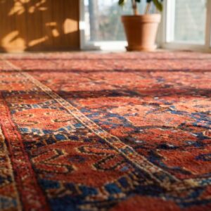 Antique Ersari - Beshir Persian Knotted Coral Rug (SKU 19957) - in-room detail