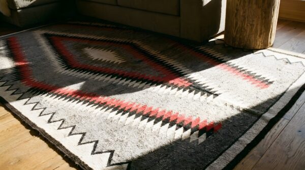 Exciting tribal geometric diamond design antique gray native american navajo flatweave rug 10 Exciting tribal geometric diamond design antique gray native american navajo flatweave rug (sku 25456) - in-room detail
