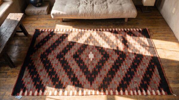 Exciting tribal geometric antique native american flatweave navajo rio grande rug (sku 21392) - styled overhead view