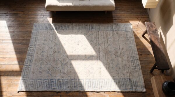 Faded decorative light ivory color antique small cotton agra rug 2 Faded decorative light ivory color antique small cotton agra rug (sku 21355) - styled overhead view
