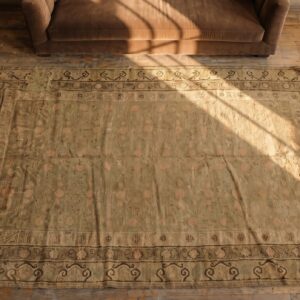 Faded Antique East Turkestan Wool Pile Hand Knotted Khotan Rug (SKU 19650) - styled overhead view
