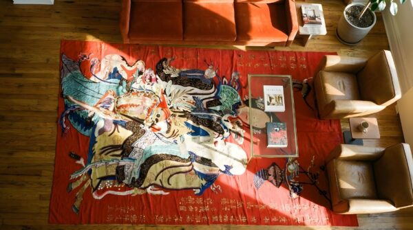 Antique figural chinese allover red color pictorial textile art 2 Antique figural chinese allover red color pictorial textile art (sku 23721) - styled overhead view