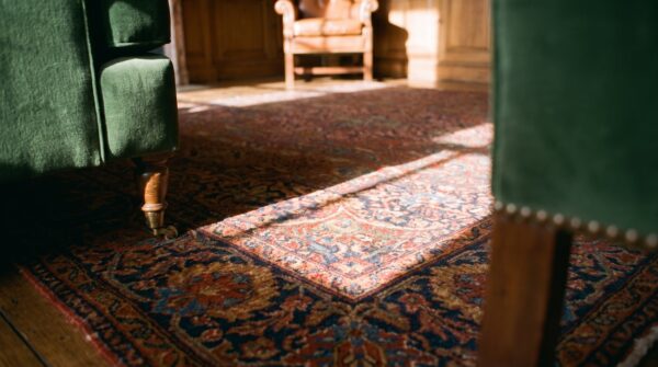 Finely woven small antique floral medallion pattern persian kashan rug 10 Finely woven small antique floral medallion pattern persian kashan rug (sku 20214) - in-room detail
