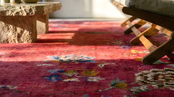 Wool floral 1920s antique rectangle hand knotted pile red rug (sku 25801) - in-room detail
