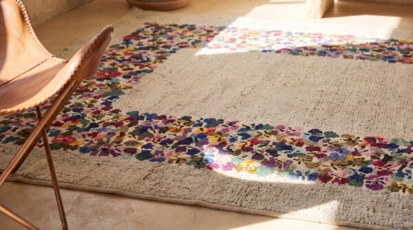 Antique floral wool & cotton hooked - loop pile ivory beige cream white 1940s rug 8 Antique floral wool & cotton hooked - loop pile ivory beige cream white 1940s rug (sku 20084) - in-room detail