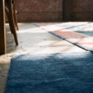 Antique Floral Wool Hand Knotted Pile Blue 1920s Rug (SKU 21944) - in-room detail