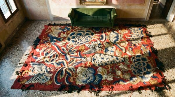 Antique floral chinese small size wool & silk coral color framed textile (sku 25604) - styled overhead view