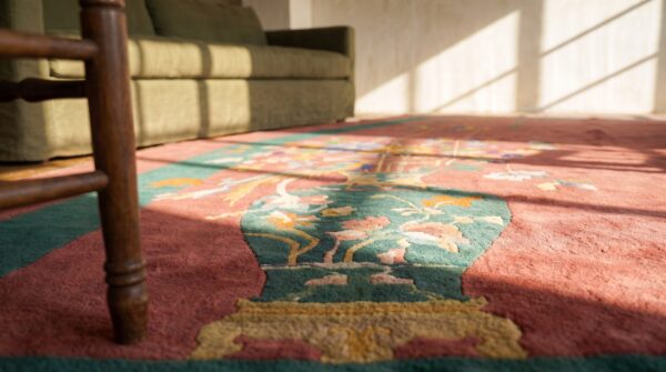 Antique floral wool hand knotted pile coral 1920s rug 4 Antique floral wool hand knotted pile coral 1920s rug (sku 20878) - in-room detail