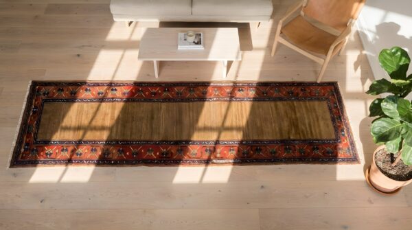 Antique floral wool hand knotted hallway runner rug 1890s 2 Antique floral wool hand knotted hallway runner rug 1890s (sku 22667) - styled overhead view