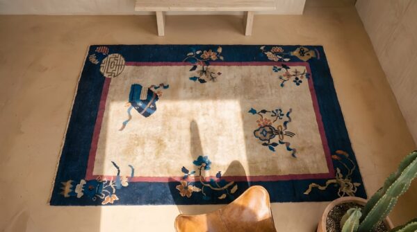 Floral antique hand knotted pile ivory beige cream white 1920s rectangle wool rug (sku 23219) - styled overhead view
