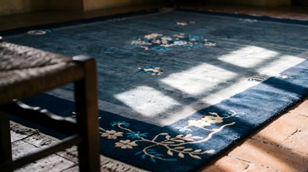 Antique floral medallion wool hand knotted pile gray 1920s rug 9 Antique floral medallion wool hand knotted pile gray 1920s rug (sku 22956) - in-room detail