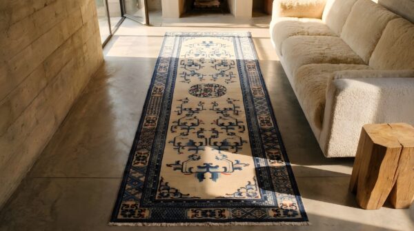 Floral medallion hand knotted wool ivory beige cream white antique 1900s hallway runner rug 2 Floral medallion hand knotted wool ivory beige cream white antique 1900s hallway runner rug (sku 22202) - styled overhead view