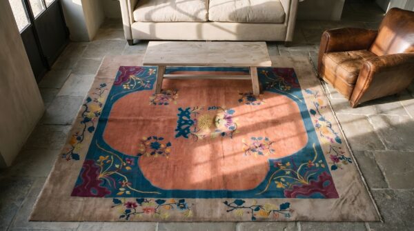 Floral medallion rectangle hand knotted pile 1920s antique wool coral rug (sku 22688) - styled overhead view