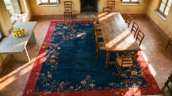 Floral wool rectangle hand knotted pile blue 1920s antique rug 2 Floral wool rectangle hand knotted pile blue 1920s antique rug (sku 24497) - styled overhead view