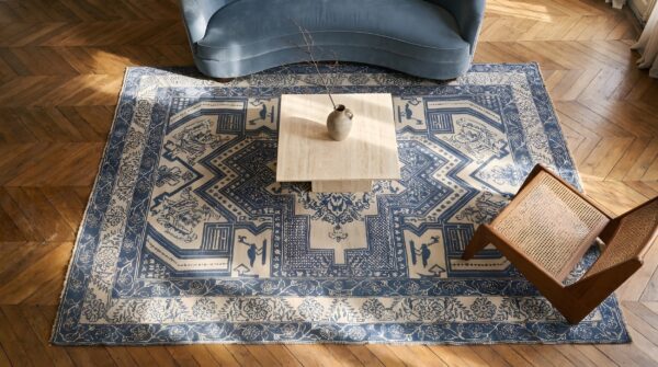 Geometric animal motif antique small size blue and white indian cotton agra rug 2 Geometric animal motif antique small size blue and white indian cotton agra rug (sku 22085) - styled overhead view