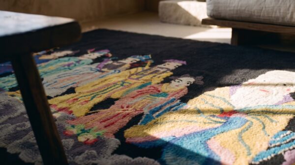 Antique geometric wool hand knotted pile black 1920s rug (sku 24495) - in-room detail