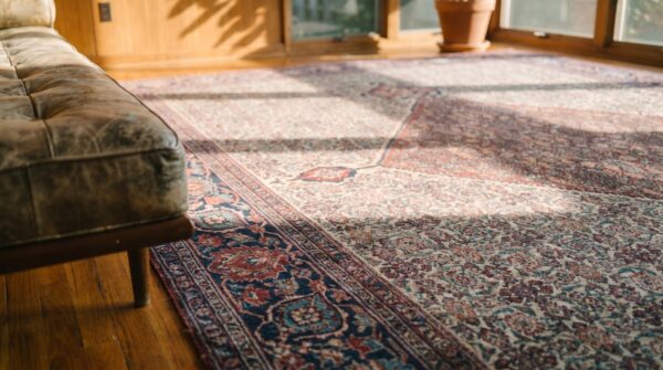 Geometric center medallion room size antique persian knotted khorassan rug 8 Geometric center medallion room size antique persian knotted khorassan rug (sku 17822) - in-room detail