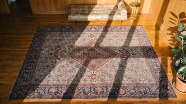 Geometric center medallion room size antique persian knotted khorassan rug 2 Geometric center medallion room size antique persian knotted khorassan rug (sku 17822) - styled overhead view