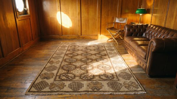 Geometric antique long and narrow size khotan east turkestan rug 6 Geometric antique long and narrow size khotan east turkestan rug (sku 19442) - room view