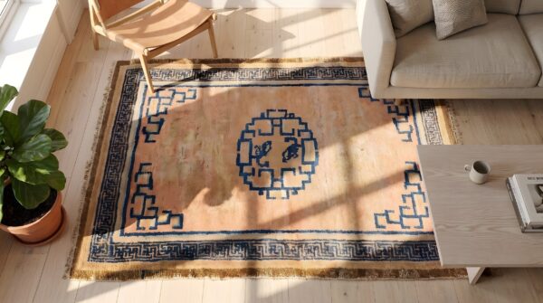Antique geometric medallion wool hand knotted pile coral 1750s rug 2 Antique geometric medallion wool hand knotted pile coral 1750s rug (sku 22200) - styled overhead view