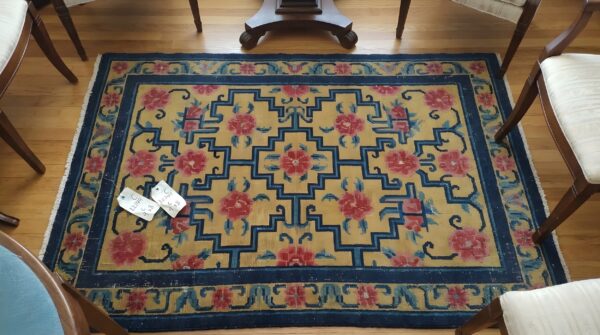 Antique geometric medallion wool hand knotted pile coral 1925 rug (sku 22144) - styled overhead view