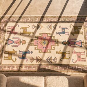 Antique Geometric People and Animals Small Scatter Size Cotton Dhurrie Rug (SKU 21544) - styled overhead view