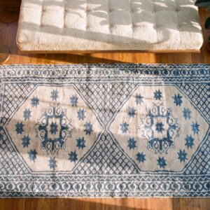 Geometric Star Pattern Antique White and Blue Color Cotton Agra Rug (SKU 20368) - styled overhead view