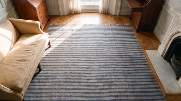 Geometric stripes blue and white color large antique indian cotton dhurrie rug 2 Geometric stripes blue and white color large antique indian cotton dhurrie rug (sku 24150) - styled overhead view