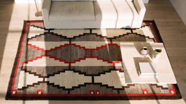 Gray antique wool 1930s square flat weave navajo rug (sku 24134) - styled overhead view