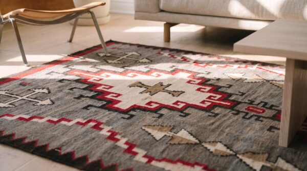 Antique gray background tribal geometric flatwoven native american navajo rug 11 Antique gray background tribal geometric flatwoven native american navajo rug (sku 20893) - in-room detail