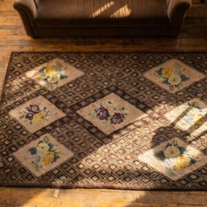 Gray Geometric Diamond Design With Ivory Floral Inlay Sections Antique American Folk Art Hooked Rug (SKU 19247) - styled overhead view