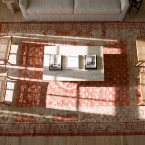 Happy Coral Color Bird Design Medallion Antique Chinese Baotou Rug (SKU 23427) - styled overhead view
