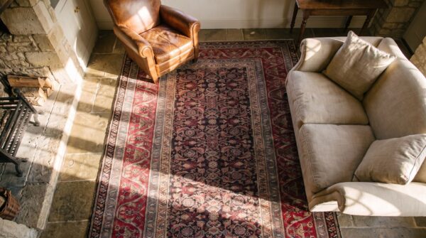 Antique indian agra rug 5'×8'7" hand-knotted wool, circa 1910 2 Antique indian agra rug 5'×8'7" hand-knotted wool, circa 1910 (sku 18010) - styled overhead view