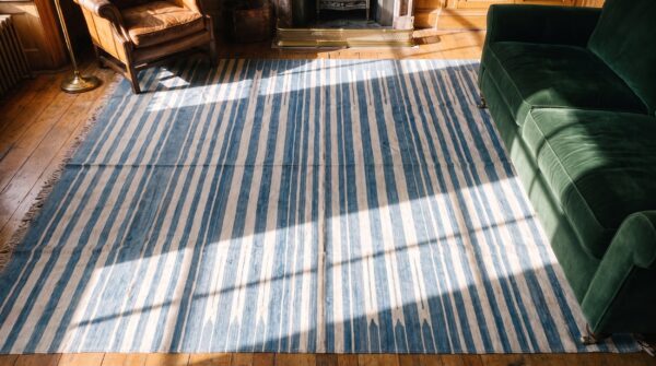 Antique indian white and blue color oversized cotton dhurrie rug 2 Antique indian white and blue color oversized cotton dhurrie rug (sku 21050) - styled overhead view