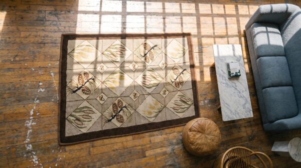 Ivory american hooked antique 1930s wool small scatter size rug (sku 19233) - styled overhead view