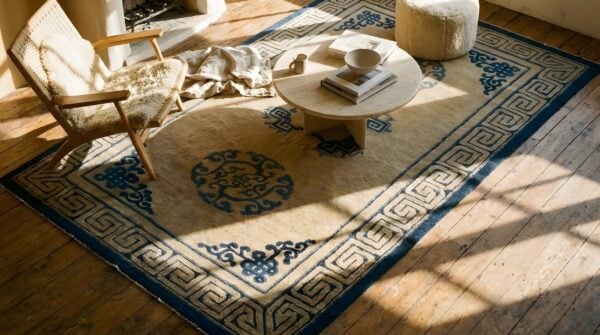 Ivory beige cream white 1890s antique wool rectangle hand knotted pile rug (sku 23873) - styled overhead view