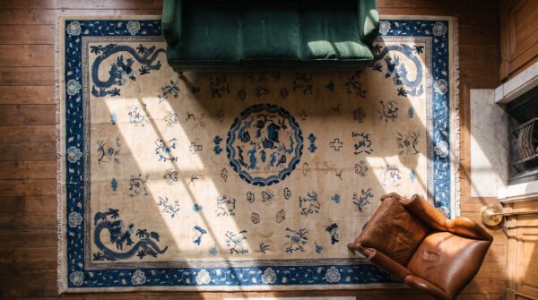 Antique ivory beige cream white 1900s hand knotted pile large wool floral medallion rectangle rug 2 Antique ivory beige cream white 1900s hand knotted pile large wool floral medallion rectangle rug (sku 21426) - styled overhead view