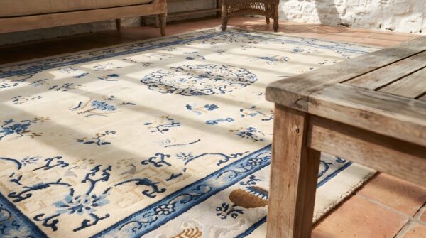Ivory beige cream white wool rectangle hand knotted pile antique 1920s floral medallion rug 8 Ivory beige cream white wool rectangle hand knotted pile antique 1920s floral medallion rug (sku 23057) - in-room detail