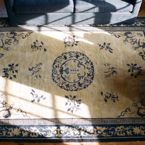 Ivory and Blue Antique Floral Medallion Chinese Carpet (SKU 25075) - styled overhead view