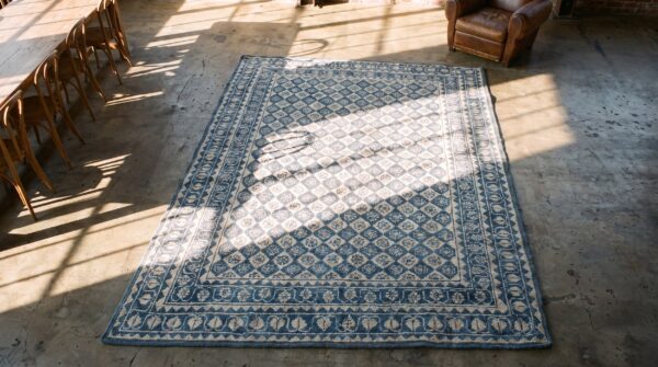 Ivory and blue antique indian allover geometric floral grid design cotton agra rug 2 Ivory and blue antique indian allover geometric floral grid design cotton agra rug (sku 21142) - styled overhead view