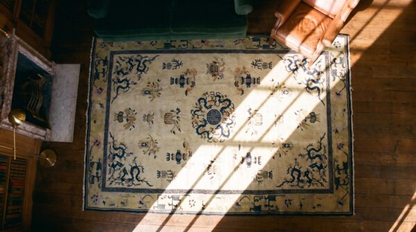 Antique ivory chinese dragon design peking rug 2 Antique ivory chinese dragon design peking rug (sku 17593) - styled overhead view