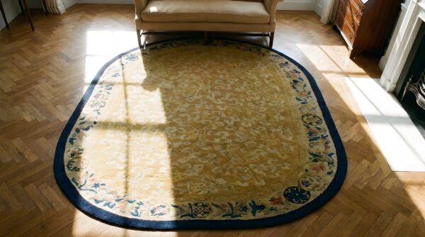 Ivory cream color antique oval chinese koi fish and bat design peking rug 2 Ivory cream color antique oval chinese koi fish and bat design peking rug (sku 23495) - styled overhead view