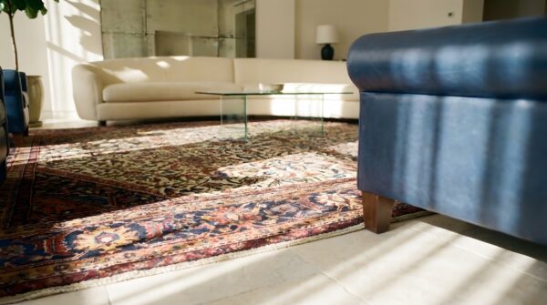 Ivory cream antique floral hand knotted wool pile rug 10 Ivory cream antique floral hand knotted wool pile rug (sku 25639) - in-room detail