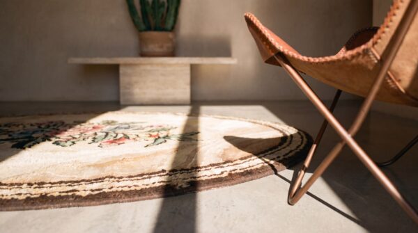 Ivory cream small antique floral medallion american hooked oval rug (sku 17293) - in-room detail